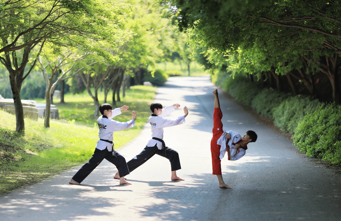 CORE Class student executing a high kick